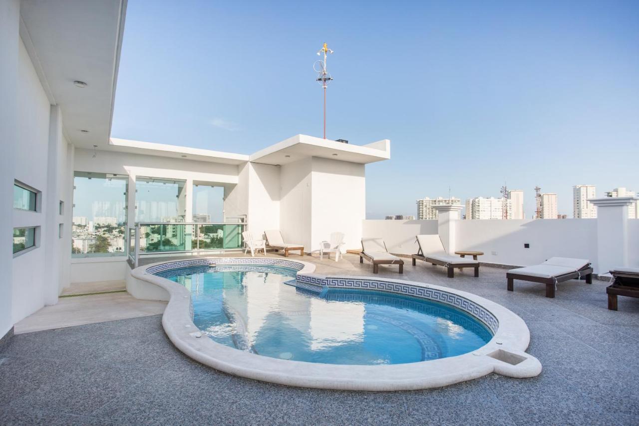Capital O Cancun Ocean View, קנקון מראה חיצוני תמונה Rooftop pool