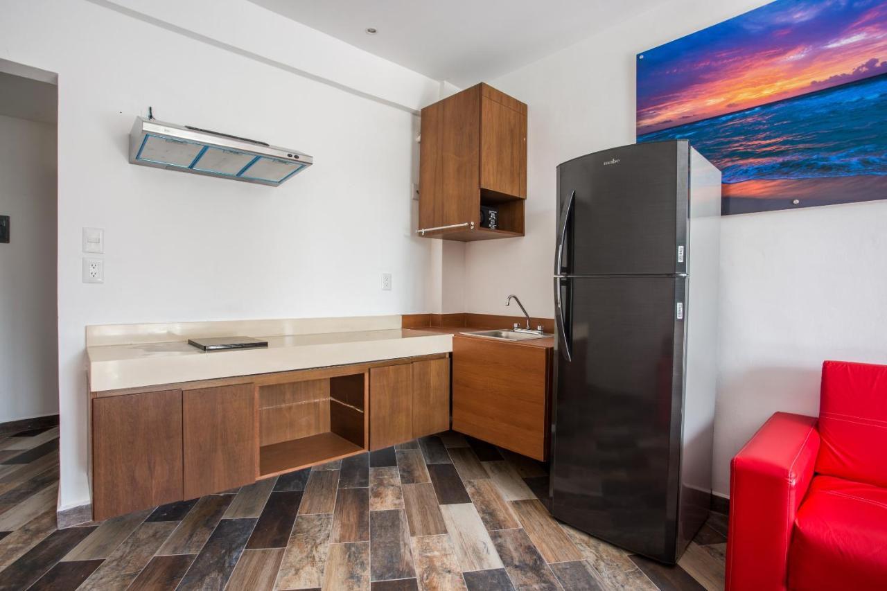 Capital O Cancun Ocean View, קנקון מראה חיצוני תמונה A typical kitchen in a studio apartment